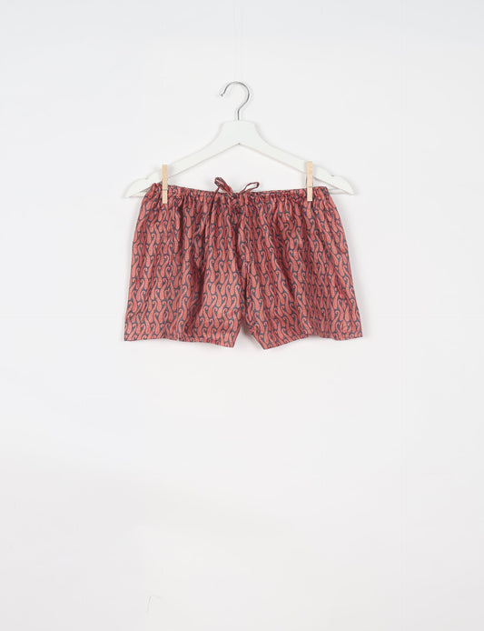 Elevate your wardrobe with our eco-friendly shorts. The all-around elastic waist and drawstring tie provide comfort and style. Crafted with ethical and sustainable practices, these shorts redefine green fashion, making them a perfect addition to your conscious clothing collection.