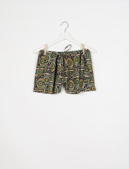 Elevate your wardrobe with our eco-friendly shorts. The all-around elastic waist and drawstring tie provide comfort and style. Crafted with ethical and sustainable practices, these shorts redefine green fashion, making them a perfect addition to your conscious clothing collection.