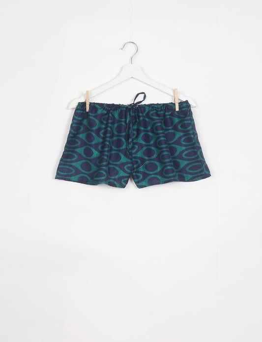 Elevate your wardrobe with our eco-friendly shorts. The all-around elastic waist and drawstring tie provide comfort and style. Crafted with ethical and sustainable practices, these shorts redefine green fashion, making them a perfect addition to your conscious clothing collection.