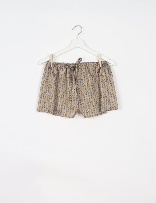 Elevate your wardrobe with our eco-friendly shorts. The all-around elastic waist and drawstring tie provide comfort and style. Crafted with ethical and sustainable practices, these shorts redefine green fashion, making them a perfect addition to your conscious clothing collection.