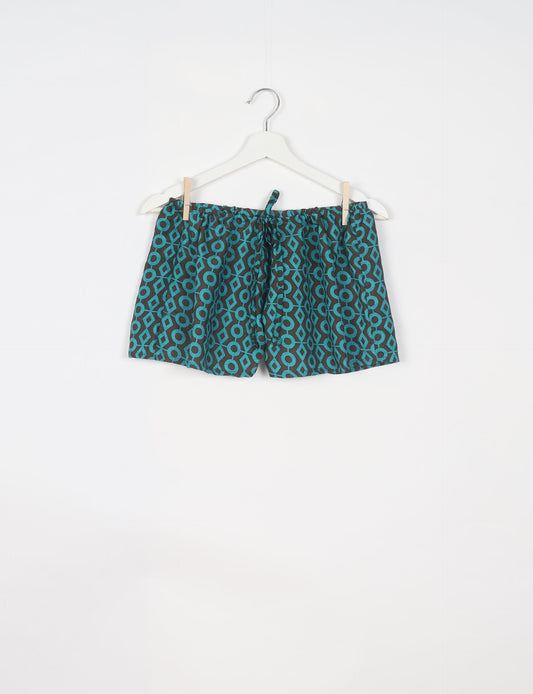 Elevate your wardrobe with our eco-friendly shorts. The all-around elastic waist and drawstring tie provide comfort and style. Crafted with ethical and sustainable practices, these shorts redefine green fashion, making them a perfect addition to your conscious clothing collection.