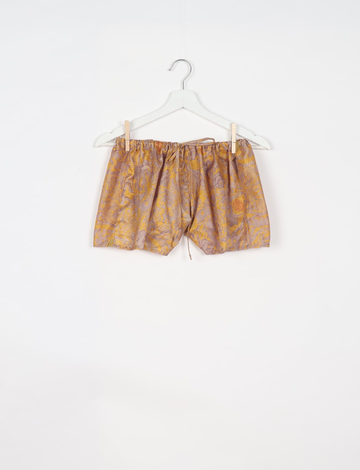 Elevate your wardrobe with our eco-friendly shorts. The all-around elastic waist and drawstring tie provide comfort and style. Crafted with ethical and sustainable practices, these shorts redefine green fashion, making them a perfect addition to your conscious clothing collection.
