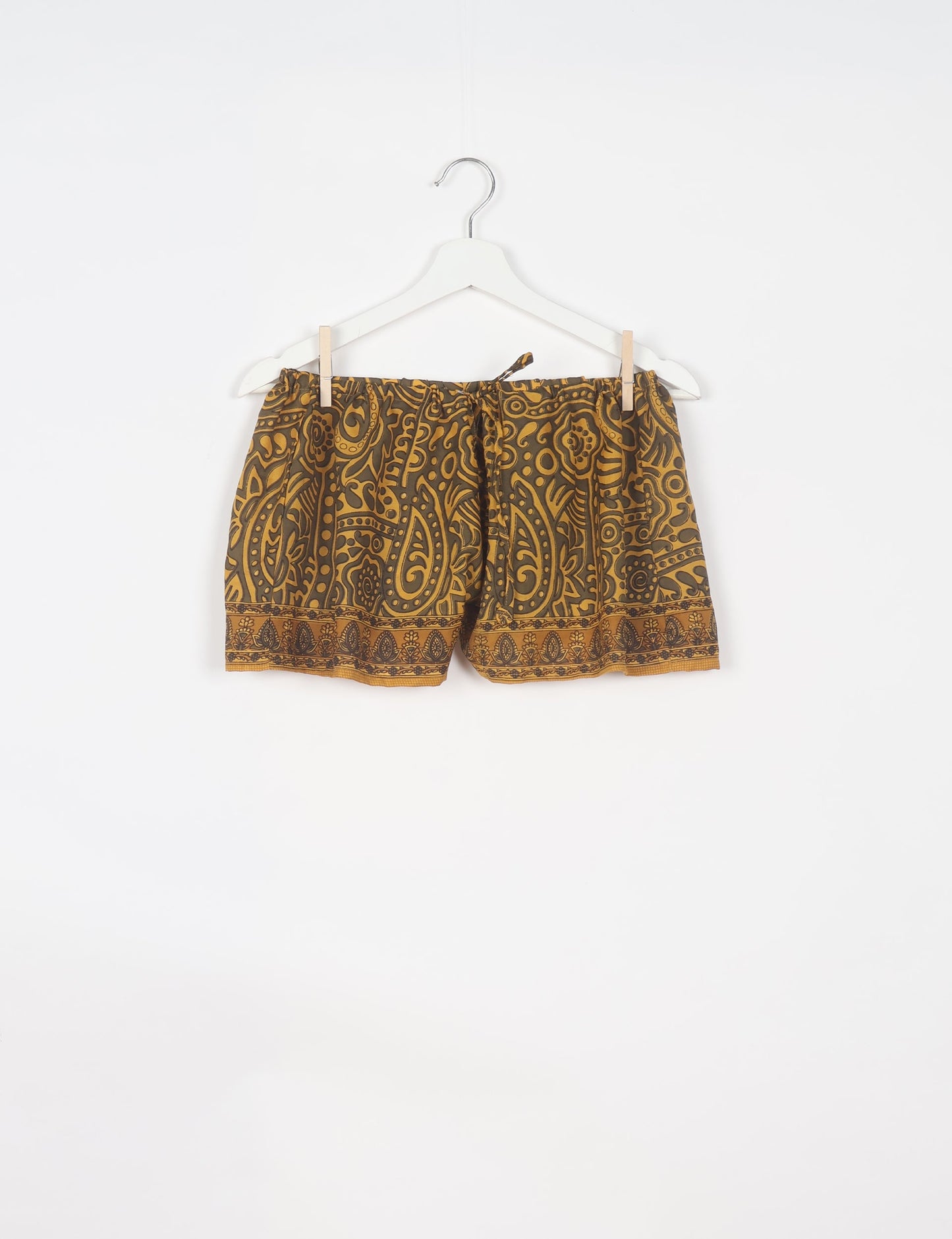 Elevate your wardrobe with our eco-friendly shorts. The all-around elastic waist and drawstring tie provide comfort and style. Crafted with ethical and sustainable practices, these shorts redefine green fashion, making them a perfect addition to your conscious clothing collection.