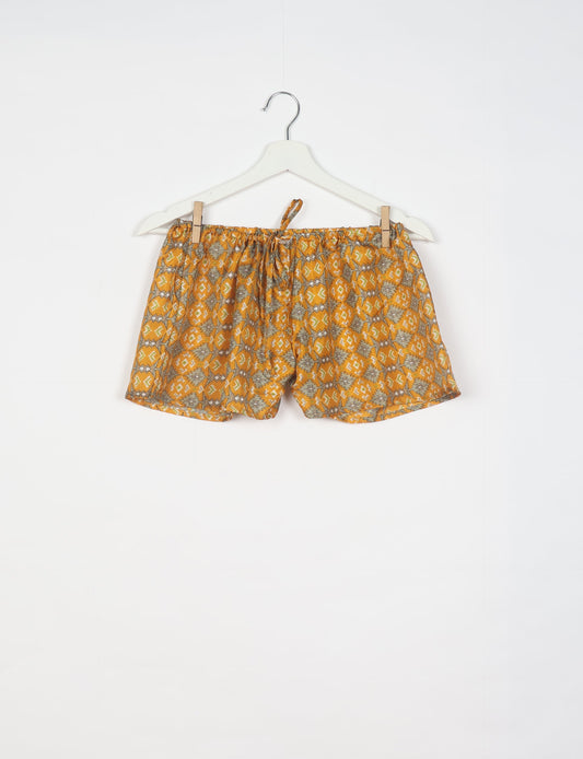 Elevate your wardrobe with our eco-friendly shorts. The all-around elastic waist and drawstring tie provide comfort and style. Crafted with ethical and sustainable practices, these shorts redefine green fashion, making them a perfect addition to your conscious clothing collection.