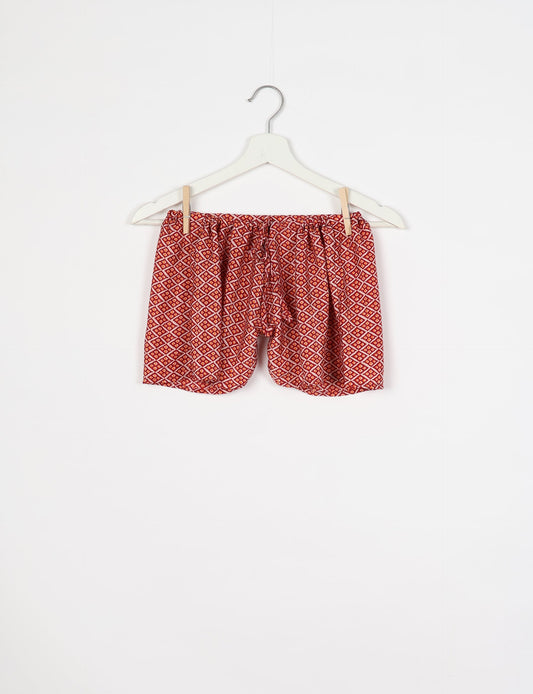 Elevate your wardrobe with our eco-friendly shorts. The all-around elastic waist and drawstring tie provide comfort and style. Crafted with ethical and sustainable practices, these shorts redefine green fashion, making them a perfect addition to your conscious clothing collection.