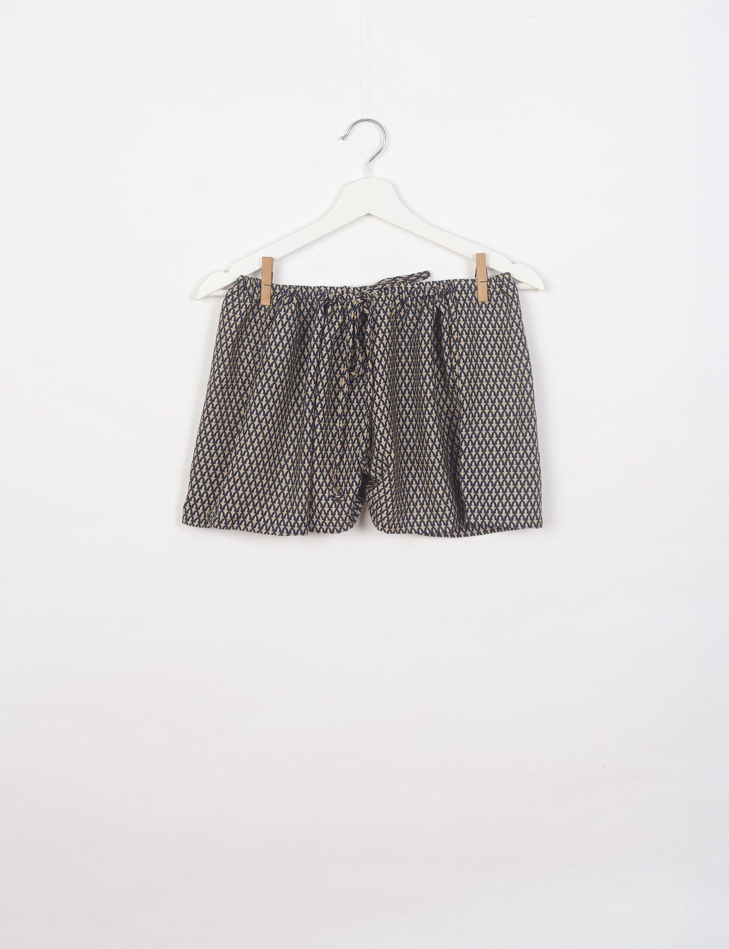 Sleep in eco-friendly luxury with our PJ Set Short. Made for the conscious consumer, these pajamas contribute to zero waste and sustainable practices. The cami top, adorned with delicate eyelash lace and cut on the bias, pairs seamlessly with the comfy shorts featuring an elasticated waist and drawstring tie.