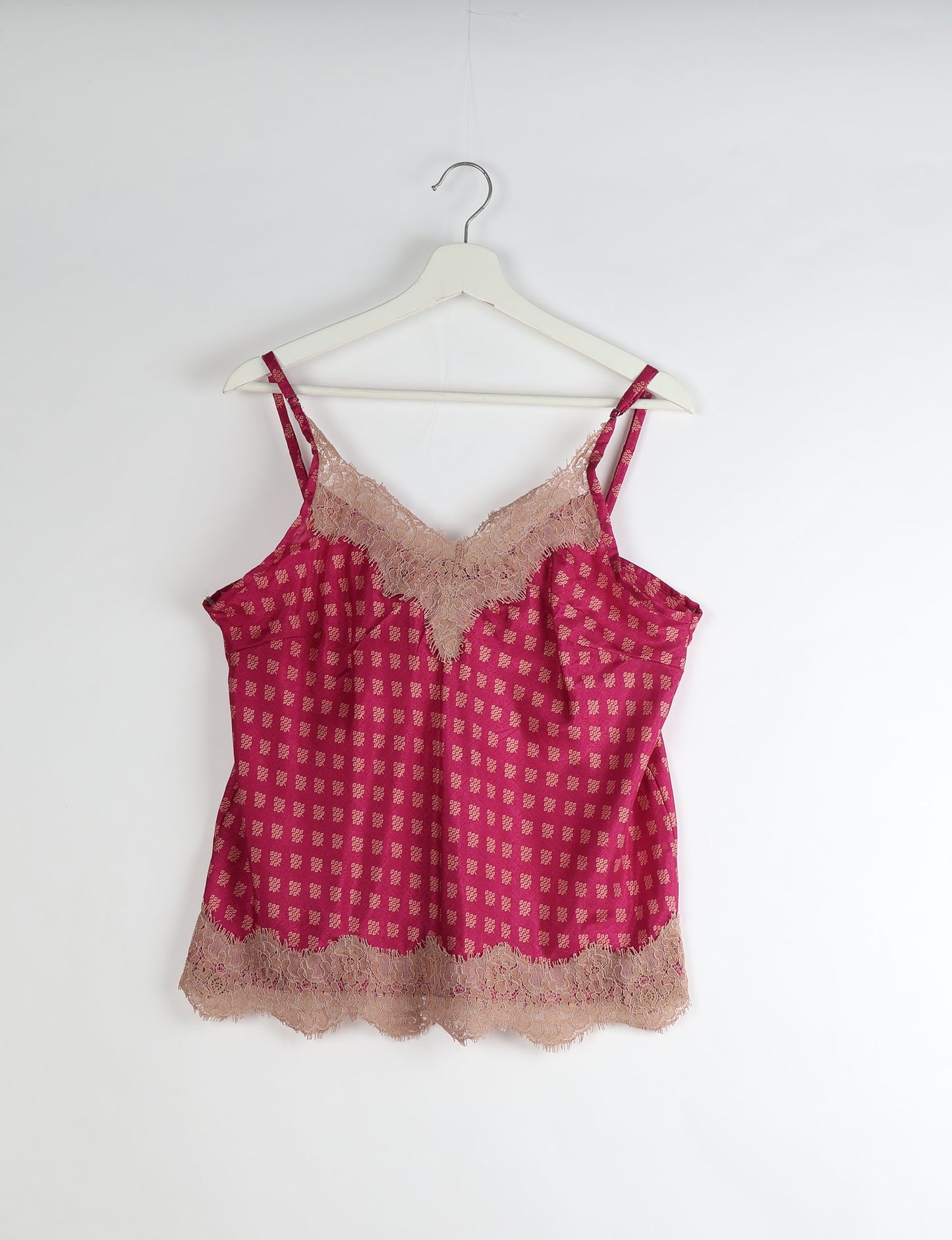 Sleep in eco-friendly luxury with our PJ Set Short. Made for the conscious consumer, these pajamas contribute to zero waste and sustainable practices. The cami top, adorned with delicate eyelash lace and cut on the bias, pairs seamlessly with the comfy shorts featuring an elasticated waist and drawstring tie.