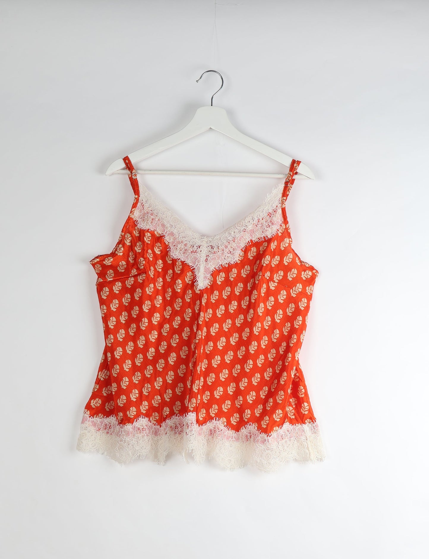 Sleep in eco-friendly luxury with our PJ Set Short. Made for the conscious consumer, these pajamas contribute to zero waste and sustainable practices. The cami top, adorned with delicate eyelash lace and cut on the bias, pairs seamlessly with the comfy shorts featuring an elasticated waist and drawstring tie.