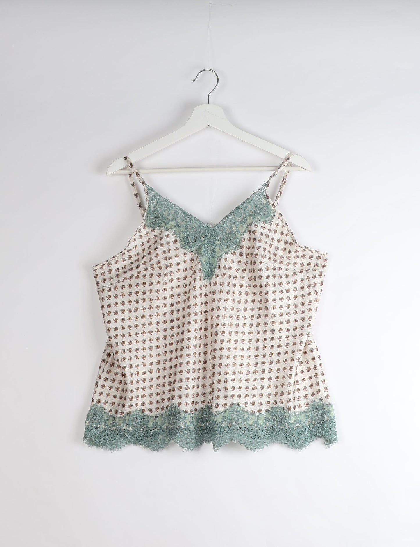 Sleep in eco-friendly luxury with our PJ Set Short. Made for the conscious consumer, these pajamas contribute to zero waste and sustainable practices. The cami top, adorned with delicate eyelash lace and cut on the bias, pairs seamlessly with the comfy shorts featuring an elasticated waist and drawstring tie.