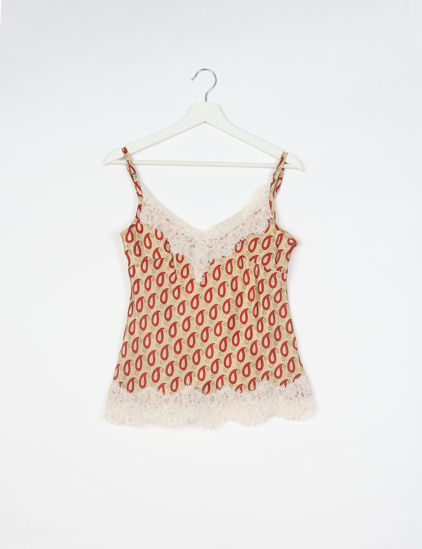 Sleep in eco-friendly luxury with our PJ Set Short. Made for the conscious consumer, these pajamas contribute to zero waste and sustainable practices. The cami top, adorned with delicate eyelash lace and cut on the bias, pairs seamlessly with the comfy shorts featuring an elasticated waist and drawstring tie.