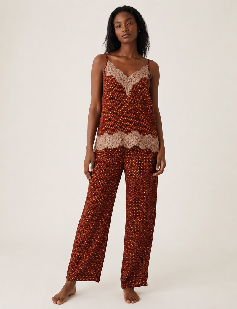 Discover the epitome of ethical sleepwear with our PJ Set Long – a blend of comfort, sustainability, and chic design. Crafted by skilled Mumbai artisans from upcycled saris, these pajamas redefine eco-friendly fashion, offering a conscious choice for your wardrobe.