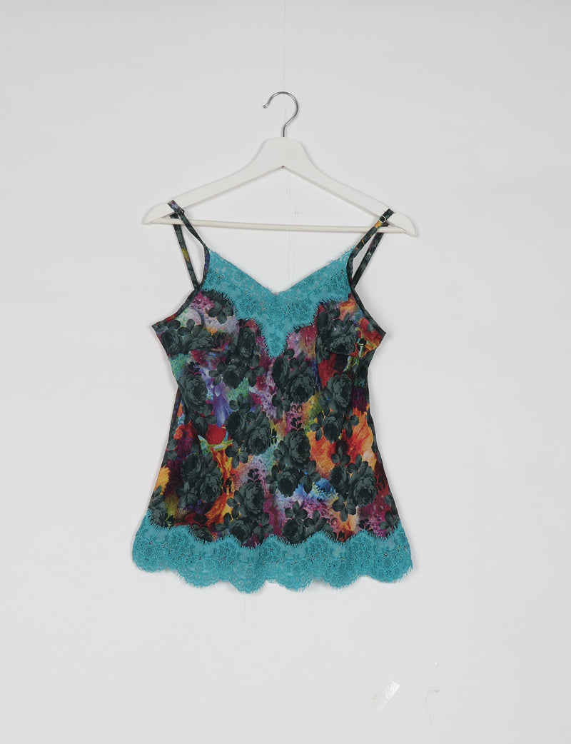 Sleeveless multicolor floral nightdress with blue lace trim on neckline and hem, hanging on white hanger against white background
