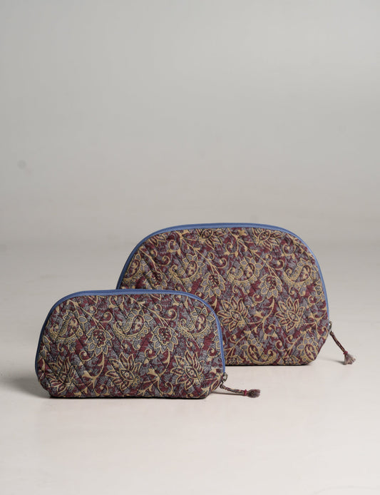 A set of two Vanity Pouches, featuring embellished beaded pullers, made from sustainable materials for eco-conscious travelers.