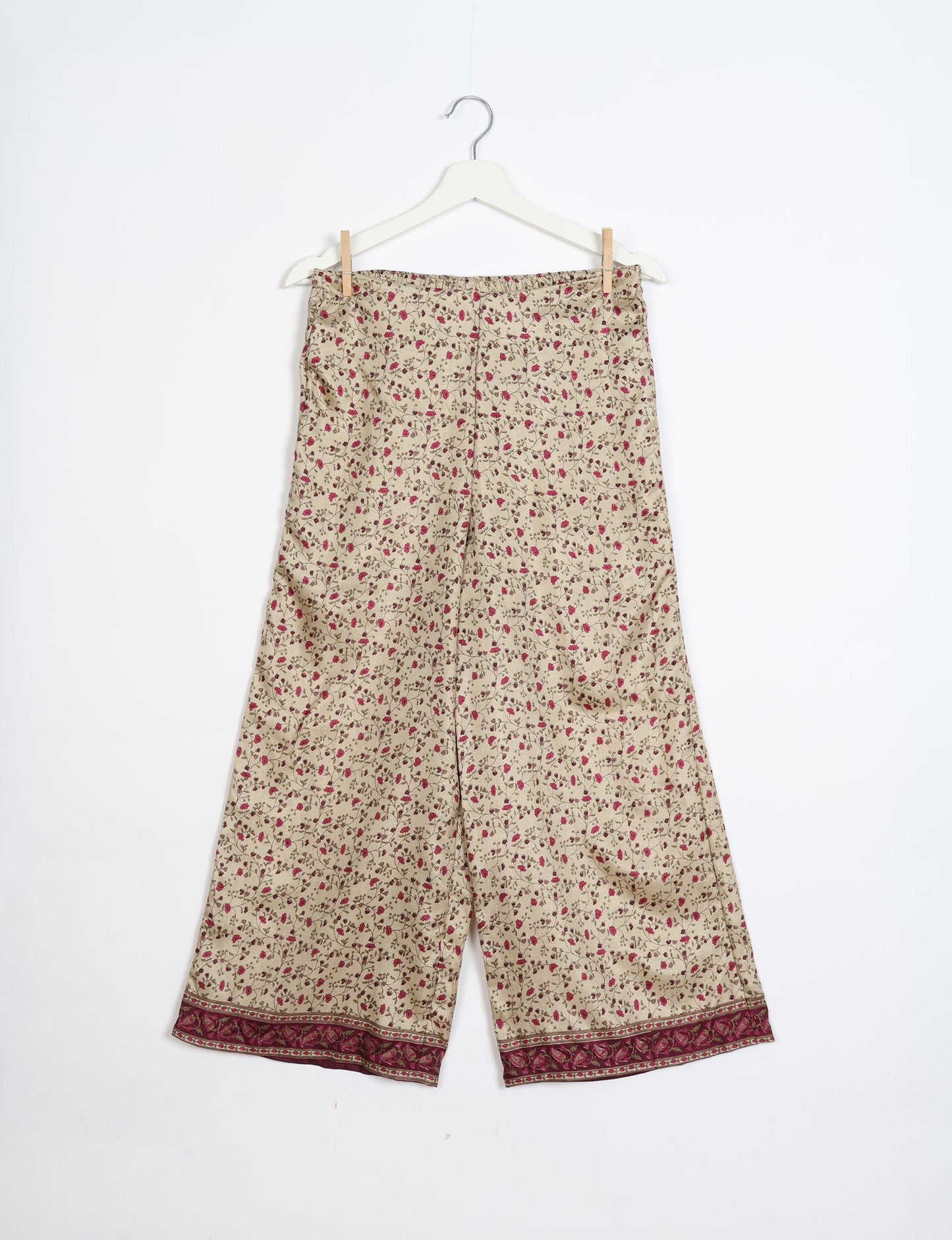 Step into sustainable fashion with our Palazzo Pants – a harmonious blend of Indian and Italian influences. These wide-legged pants, made from upcycled saris, offer comfort with an all-around elastic waist and a stylish flared leg. Make a statement with eco-friendly, chic palazzo pants that redefine ethical clothing.