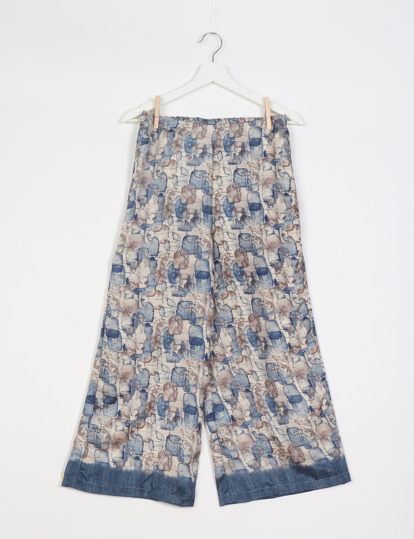 Step into sustainable fashion with our Palazzo Pants – a harmonious blend of Indian and Italian influences. These wide-legged pants, made from upcycled saris, offer comfort with an all-around elastic waist and a stylish flared leg. Make a statement with eco-friendly, chic palazzo pants that redefine ethical clothing.