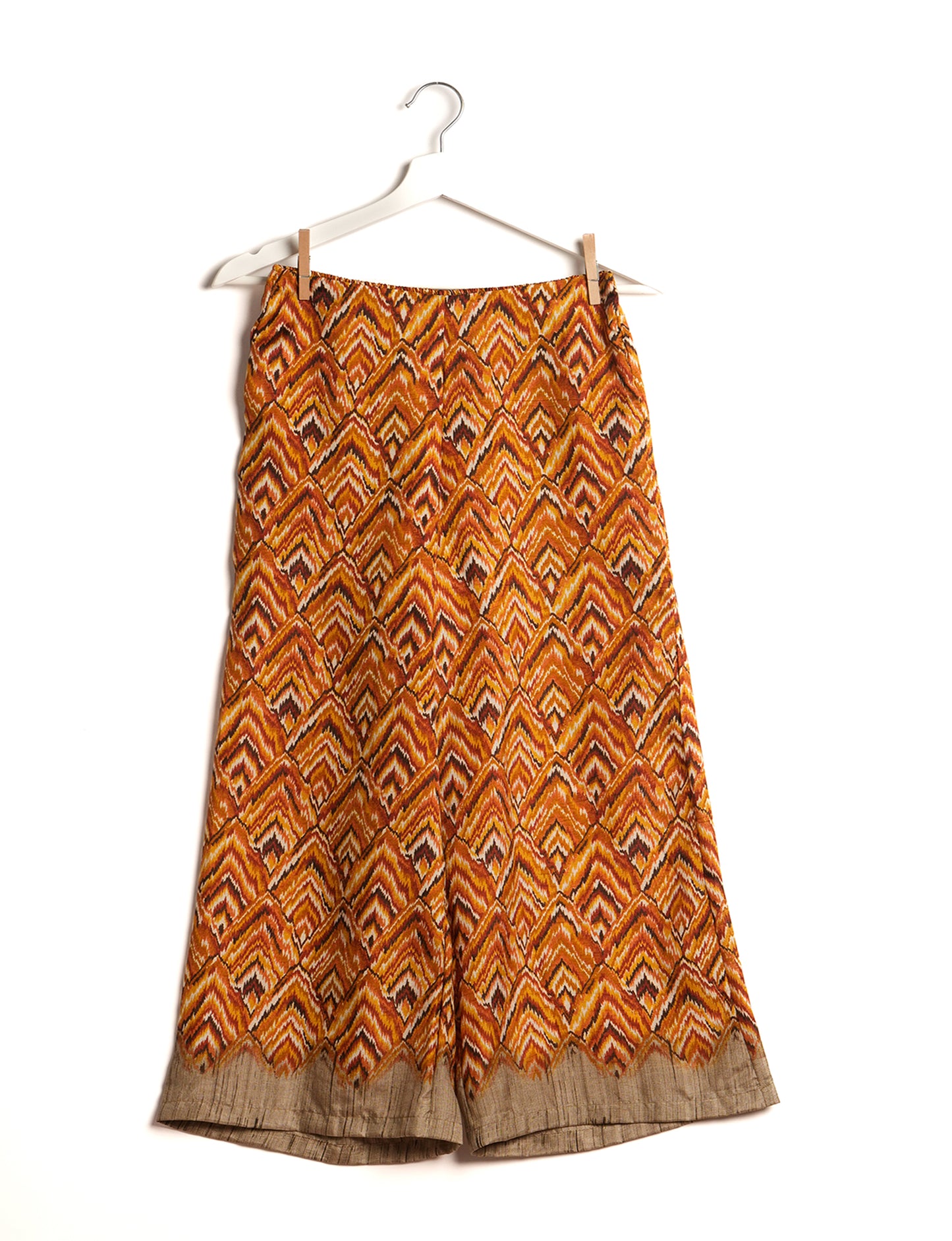 Step into sustainable fashion with our Palazzo Pants – a harmonious blend of Indian and Italian influences. These wide-legged pants, made from upcycled saris, offer comfort with an all-around elastic waist and a stylish flared leg. Make a statement with eco-friendly, chic palazzo pants that redefine ethical clothing.