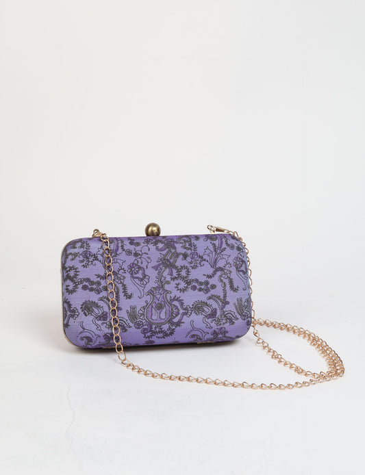 Stylish CLUTCH HANDBAG, a perfect companion for your evening look. Firm rectangular frame, optional metallic sling, and stunning prints add color to your outfit. Eco-friendly and ethically crafted for sustainable fashion.
