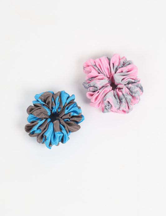 Upgrade your hairstyle with our Scrunchy Set of 2 – elastic hair ties wrapped in colorful Indian sari fabric. A top pick in ethical and green fashion, these eco-friendly prints add flair to your wrist and hair, making a sustainable style statement that catches attention and sparks change.