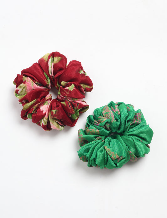 Upgrade your hairstyle with our Scrunchy Set of 2 – elastic hair ties wrapped in colorful Indian sari fabric. A top pick in ethical and green fashion, these eco-friendly prints add flair to your wrist and hair, making a sustainable style statement that catches attention and sparks change.