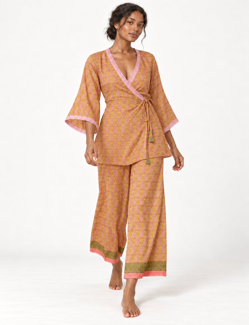 Pink tunic set with micro leaf pattern, turquoise trim on neckline and sleeves, and matching wide-leg pants with border print