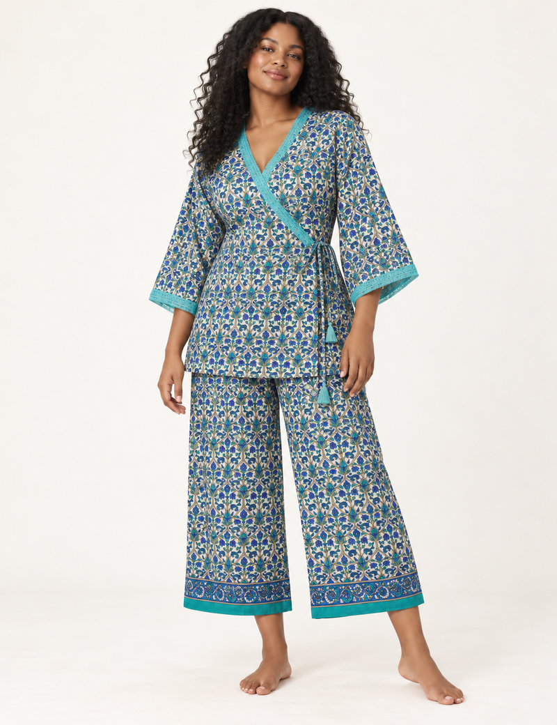 Pink tunic set with micro leaf pattern, turquoise trim on neckline and sleeves, and matching wide-leg pants with border print