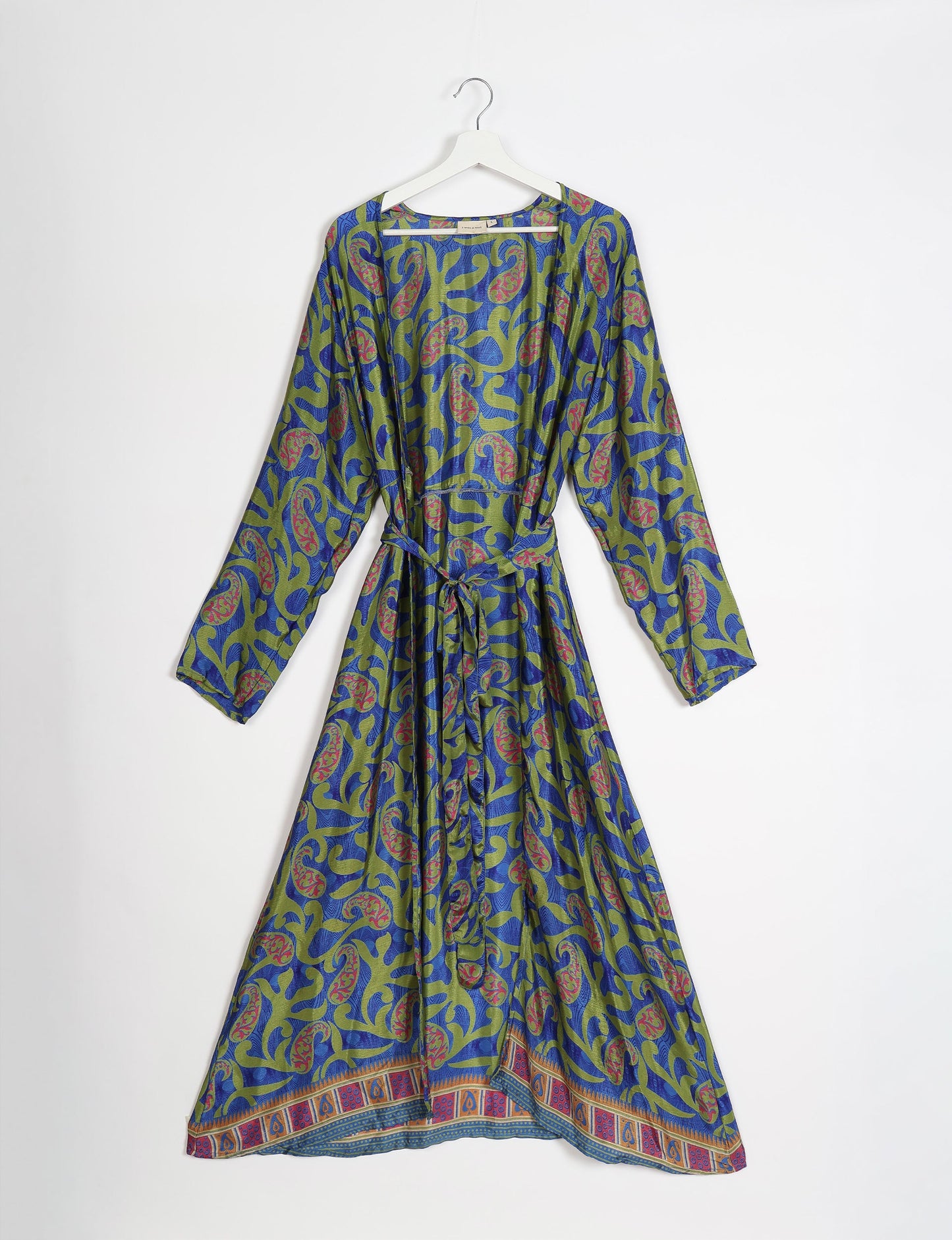 Beach robe made from upcycled saris, embodying ethical and sustainable fashion principles. Perfect for eco-conscious beachgoers and mindful living enthusiasts.