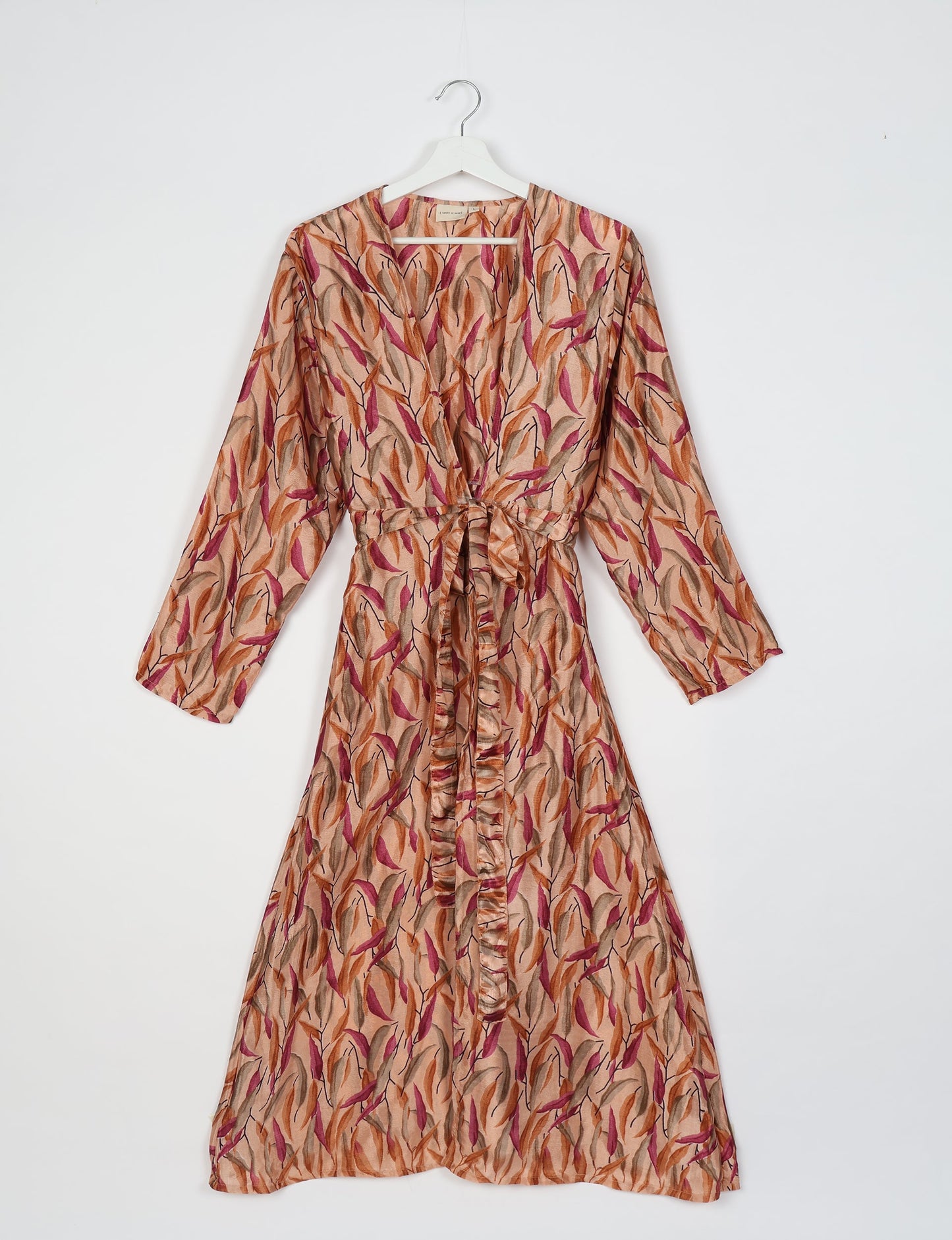 Beach robe made from upcycled saris, embodying ethical and sustainable fashion principles. Perfect for eco-conscious beachgoers and mindful living enthusiasts.