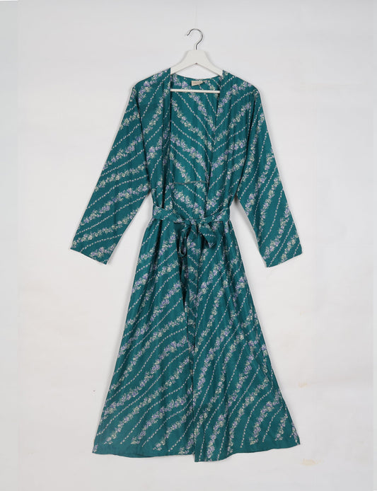 Beach robe made from upcycled saris, embodying ethical and sustainable fashion principles. Perfect for eco-conscious beachgoers and mindful living enthusiasts.