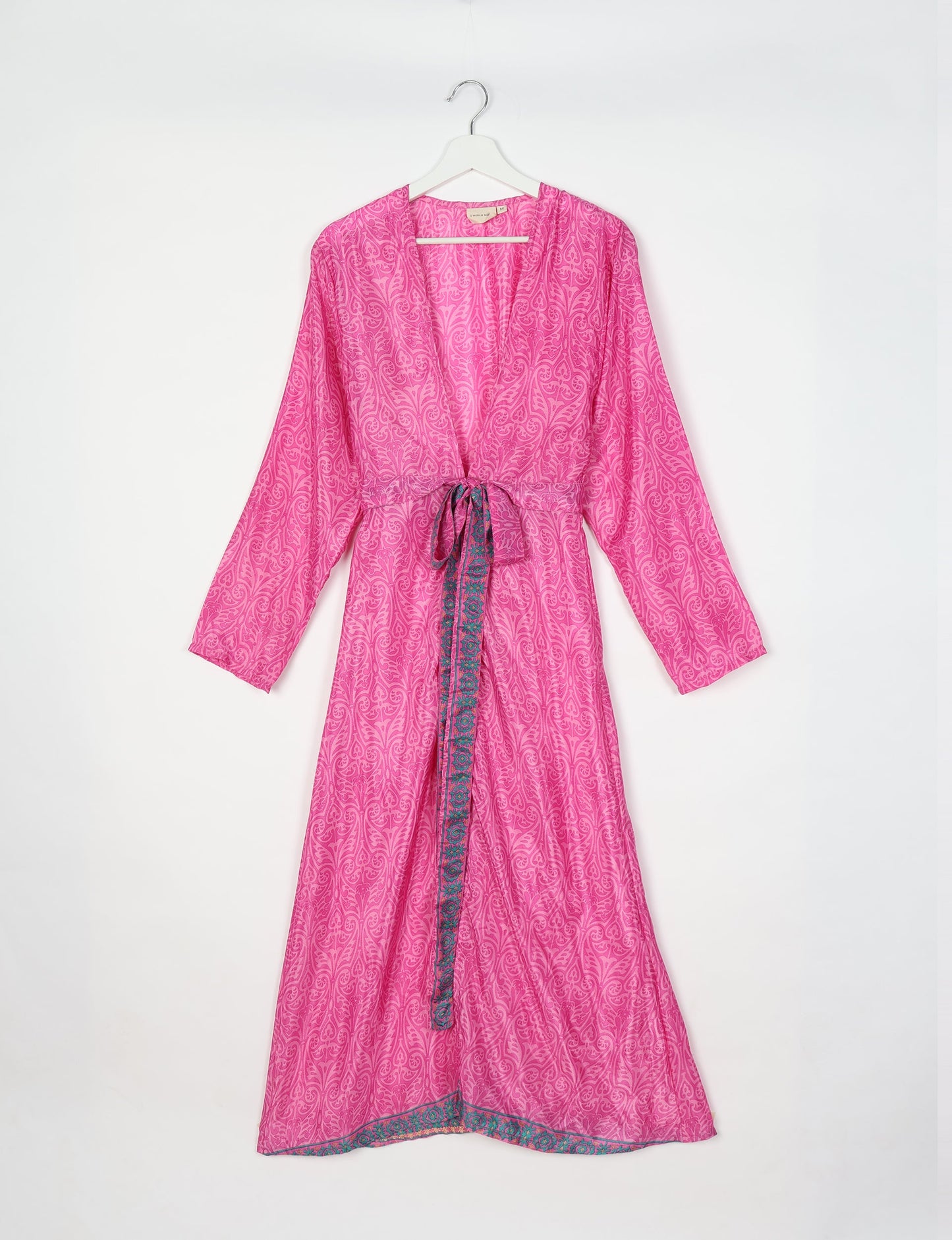Beach robe made from upcycled saris, embodying ethical and sustainable fashion principles. Perfect for eco-conscious beachgoers and mindful living enthusiasts.