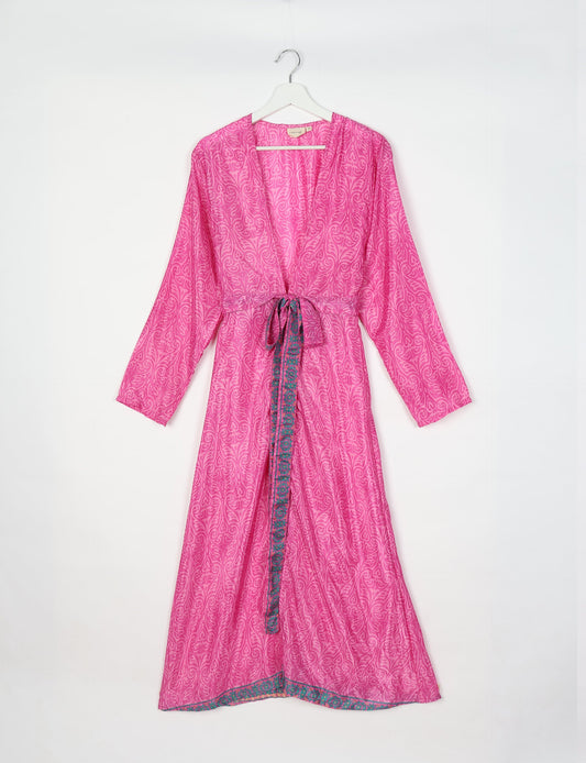 Beach robe made from upcycled saris, embodying ethical and sustainable fashion principles. Perfect for eco-conscious beachgoers and mindful living enthusiasts.