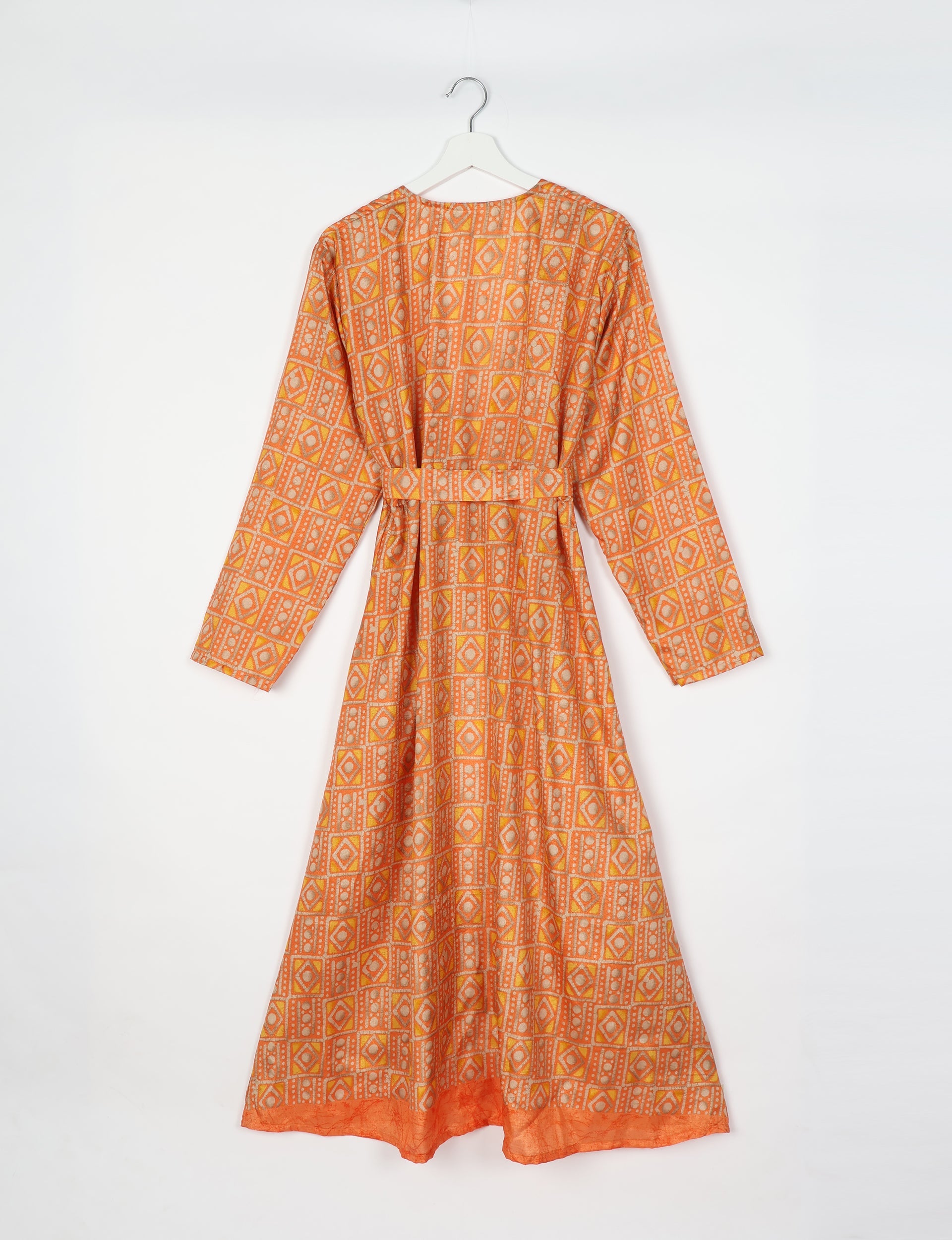 Yellow and orange geometric patterned long-sleeve beach robe with belt, shown from back on white hanger against white background
