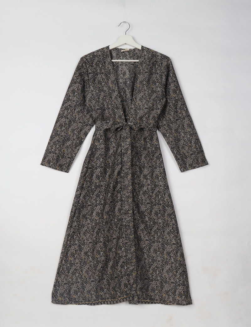 Grey tropical patterned beach robe made from upcycled sari fabric, full-length with tie-up belt, hanging on a white hanger