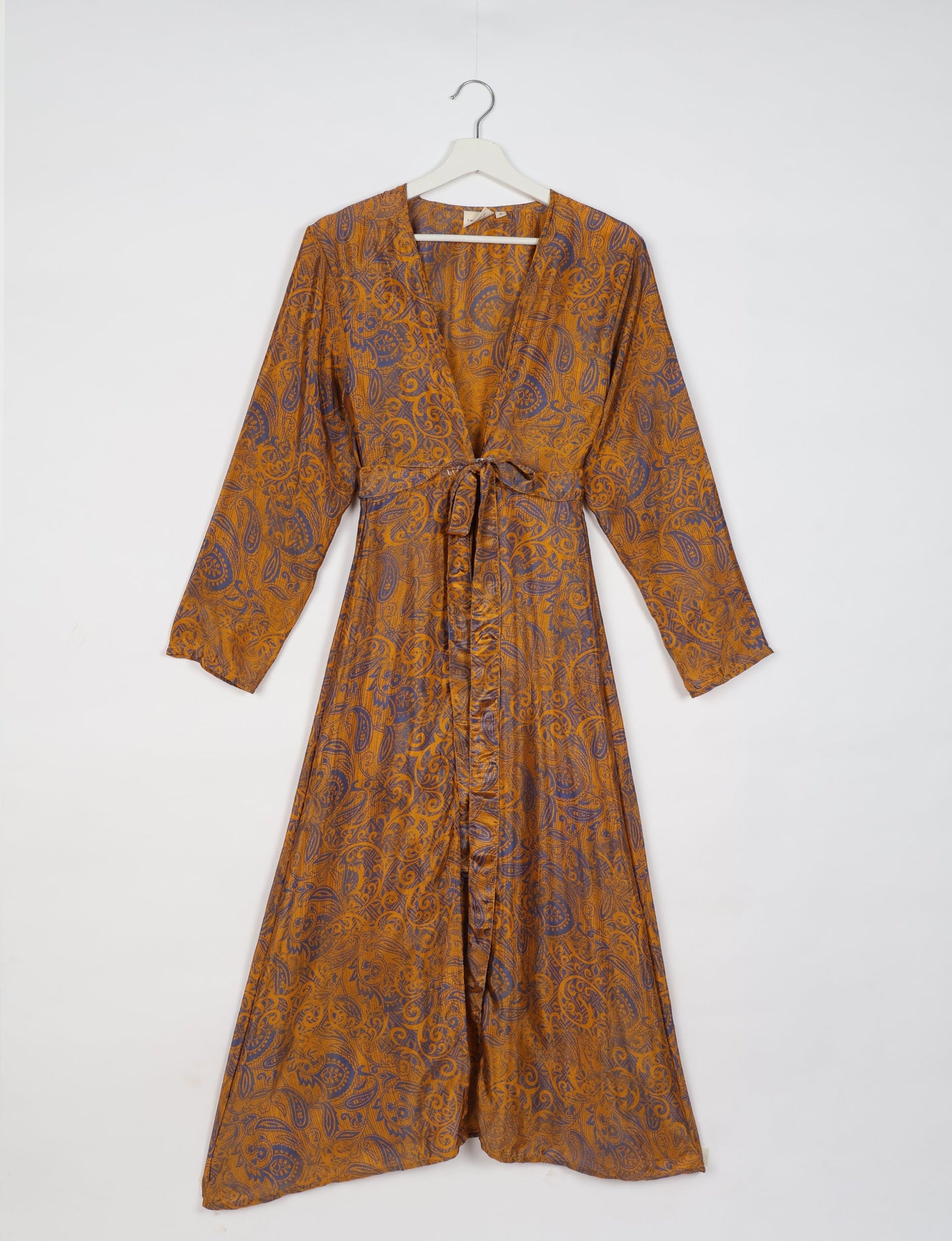 Beach robe made from upcycled saris, embodying ethical and sustainable fashion principles. Perfect for eco-conscious beachgoers and mindful living enthusiasts.