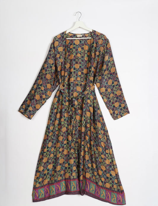 Beach robe made from upcycled saris, embodying ethical and sustainable fashion principles. Perfect for eco-conscious beachgoers and mindful living enthusiasts.