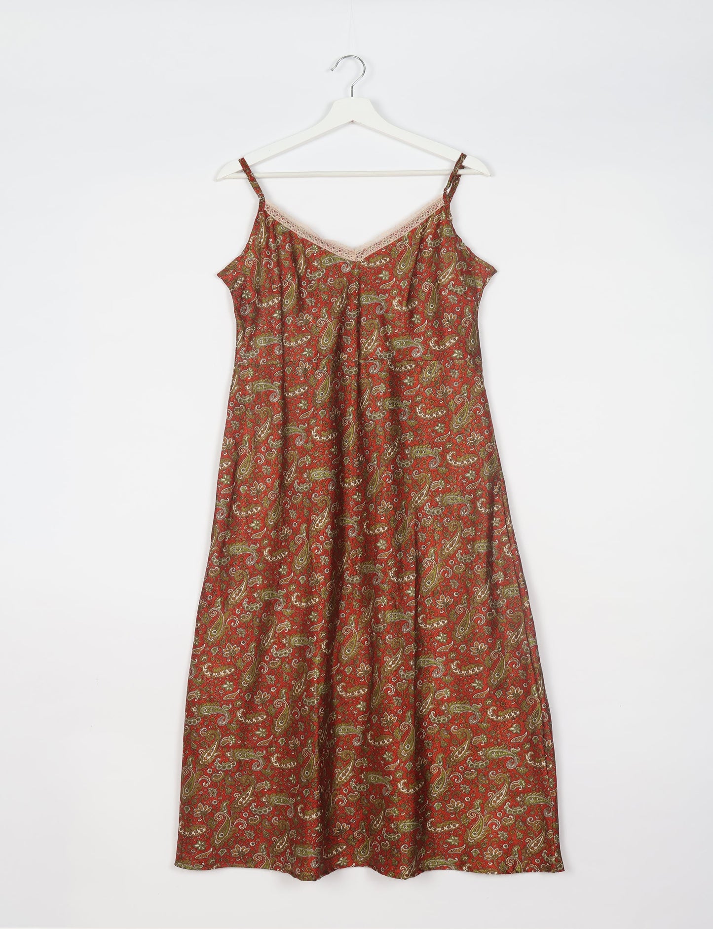 Spaghetti strap dress made from sustainable materials, embodying ethical fashion principles. Ideal for eco-friendly travelers seeking laid-back style.