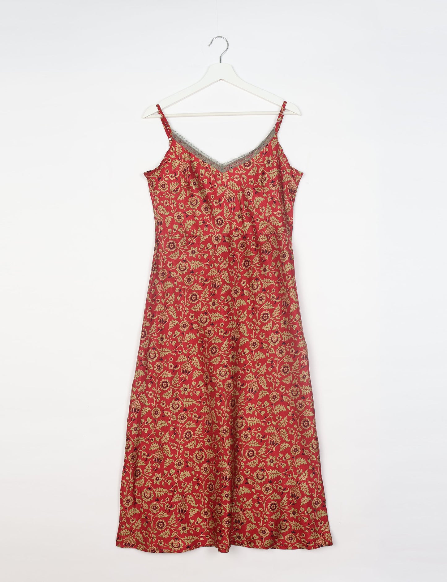 Spaghetti strap dress made from sustainable materials, embodying ethical fashion principles. Ideal for eco-friendly travelers seeking laid-back style.