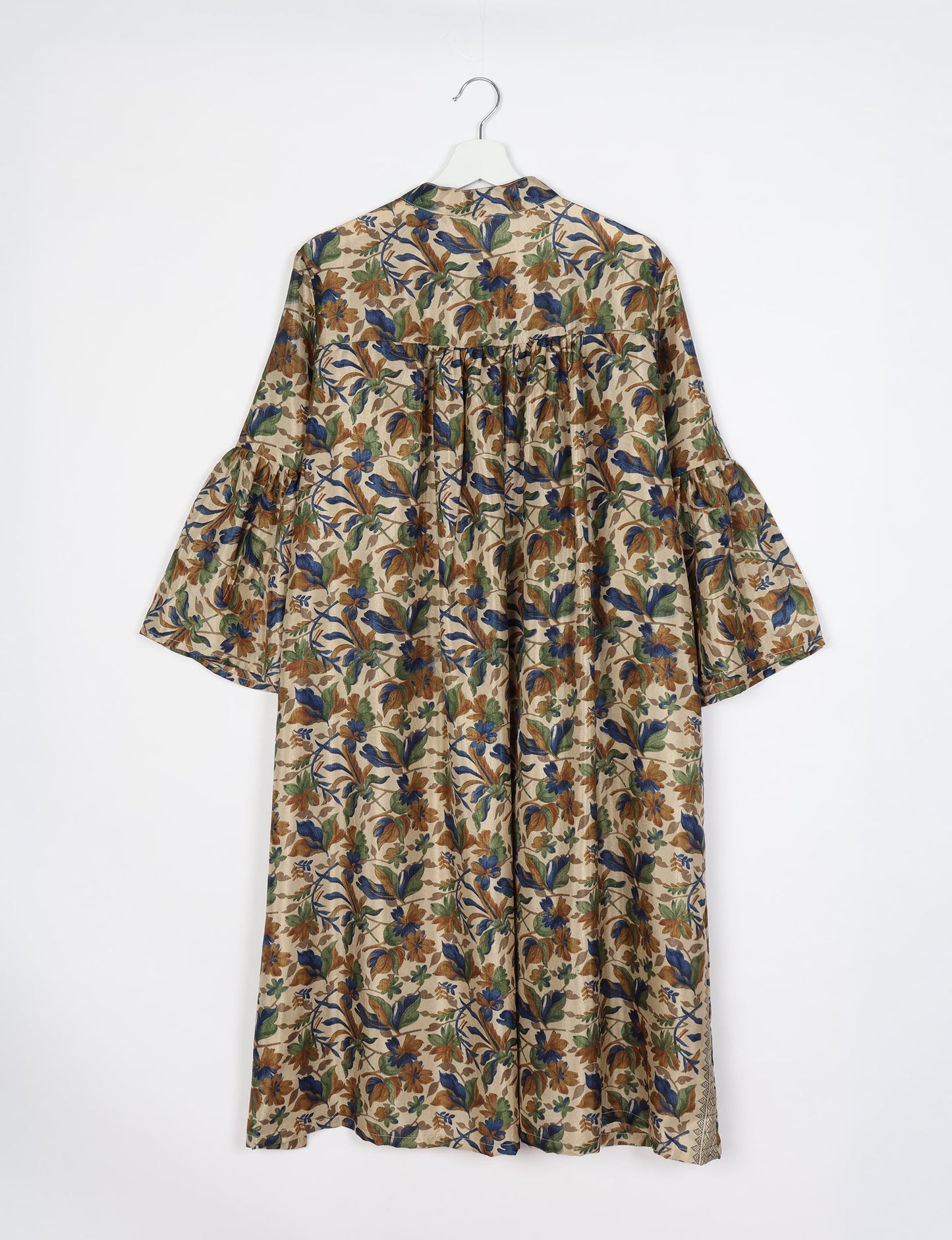 Discover ethical elegance with our Bell Sleeve Coat, handcrafted by Indian artisans from recycled materials. This sustainable fashion piece is a statement in eco-friendly clothing, combining style and consciousness effortlessly.