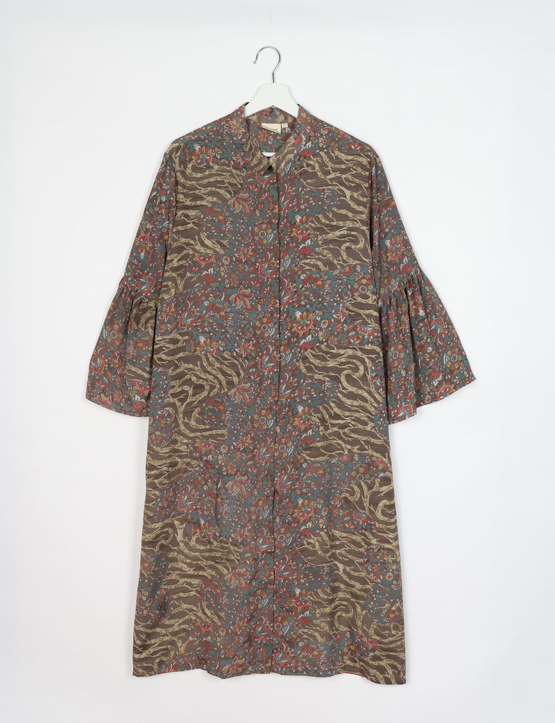 Brown tropical print bell sleeve coat with collar, front buttons, and floral and abstract patterns, hanging on white hanger