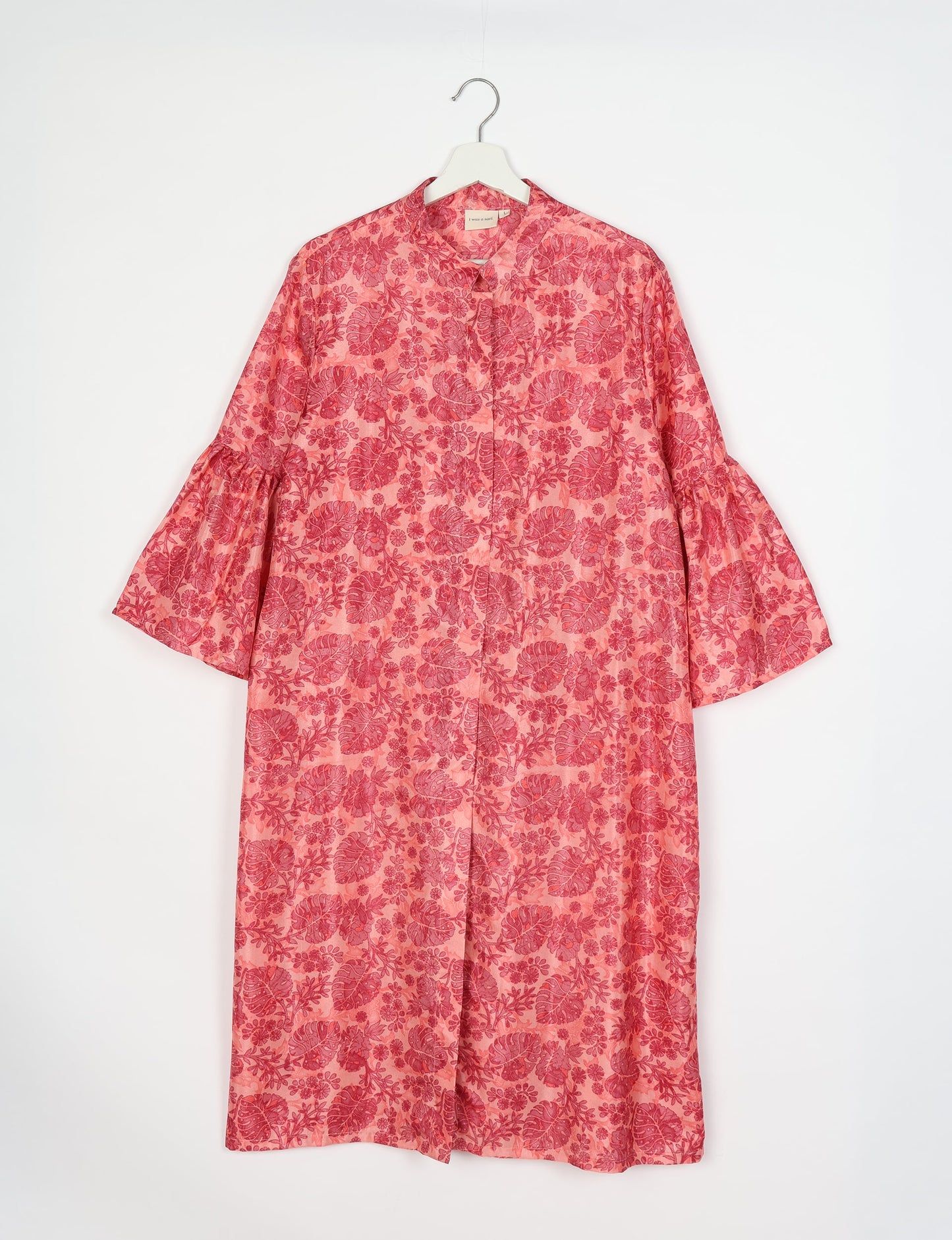 Discover ethical elegance with our Bell Sleeve Coat, handcrafted by Indian artisans from recycled materials. This sustainable fashion piece is a statement in eco-friendly clothing, combining style and consciousness effortlessly.