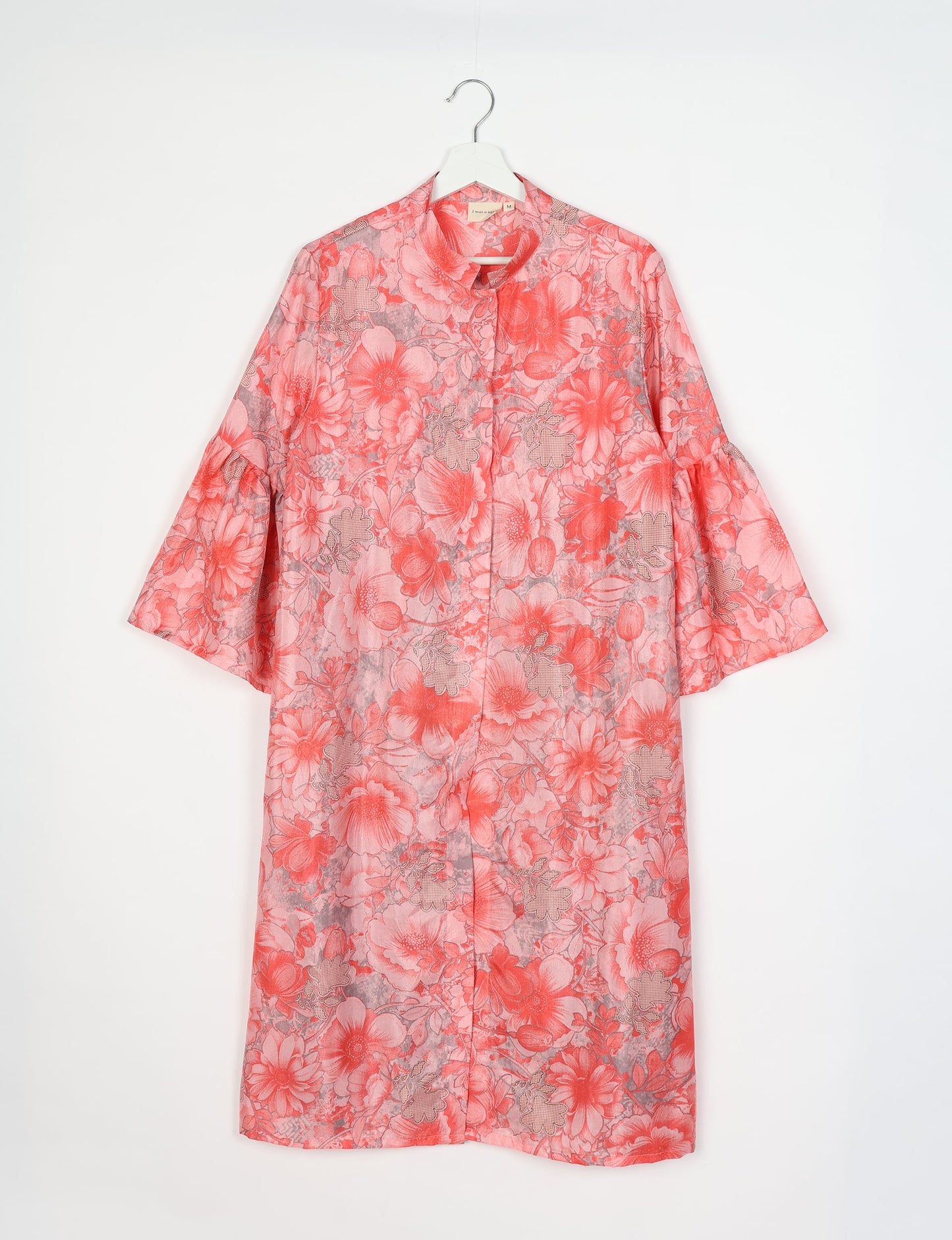 Discover ethical elegance with our Bell Sleeve Coat, handcrafted by Indian artisans from recycled materials. This sustainable fashion piece is a statement in eco-friendly clothing, combining style and consciousness effortlessly.