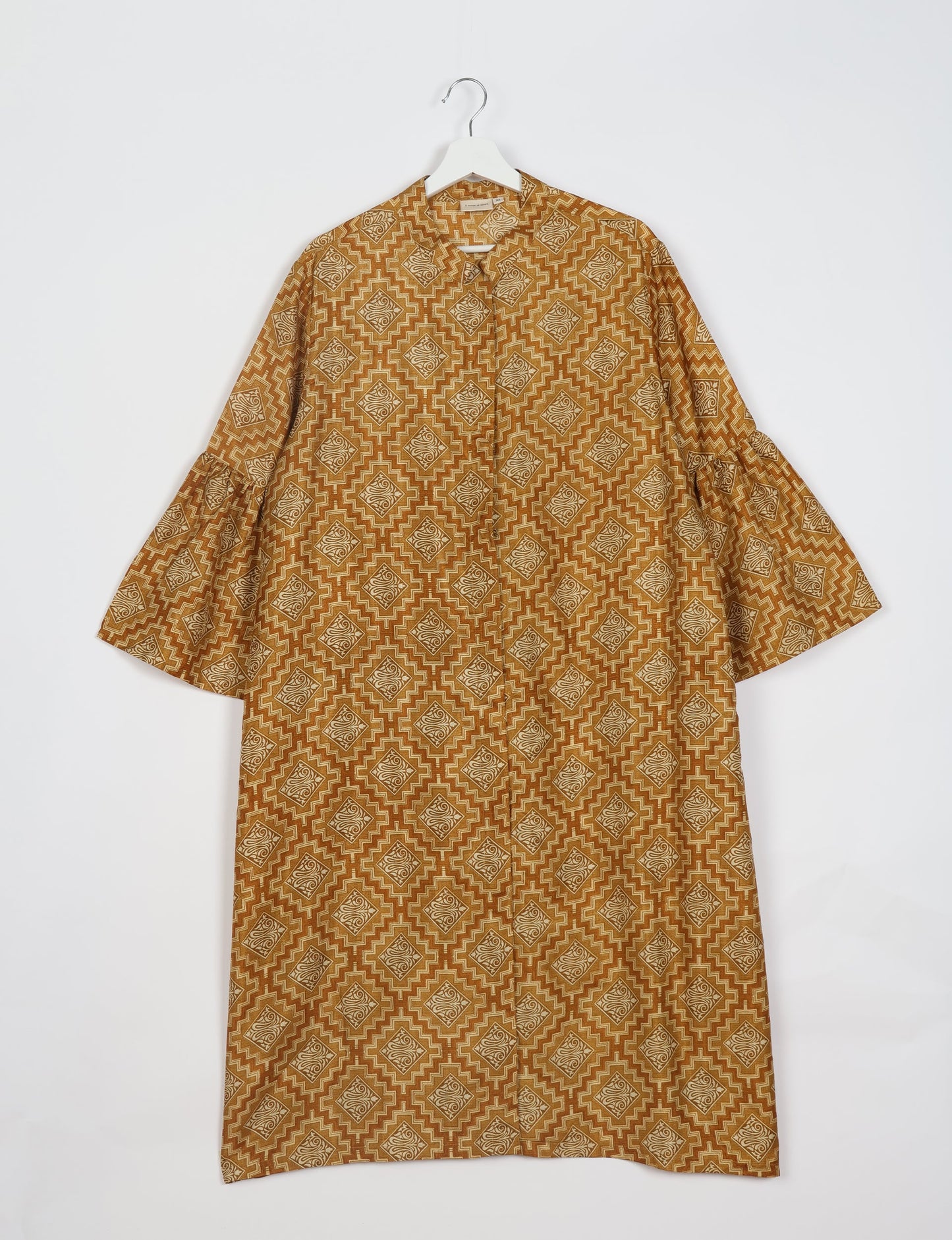 Discover ethical elegance with our Bell Sleeve Coat, handcrafted by Indian artisans from recycled materials. This sustainable fashion piece is a statement in eco-friendly clothing, combining style and consciousness effortlessly.