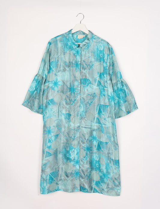 Discover ethical elegance with our Bell Sleeve Coat, handcrafted by Indian artisans from recycled materials. This sustainable fashion piece is a statement in eco-friendly clothing, combining style and consciousness effortlessly.