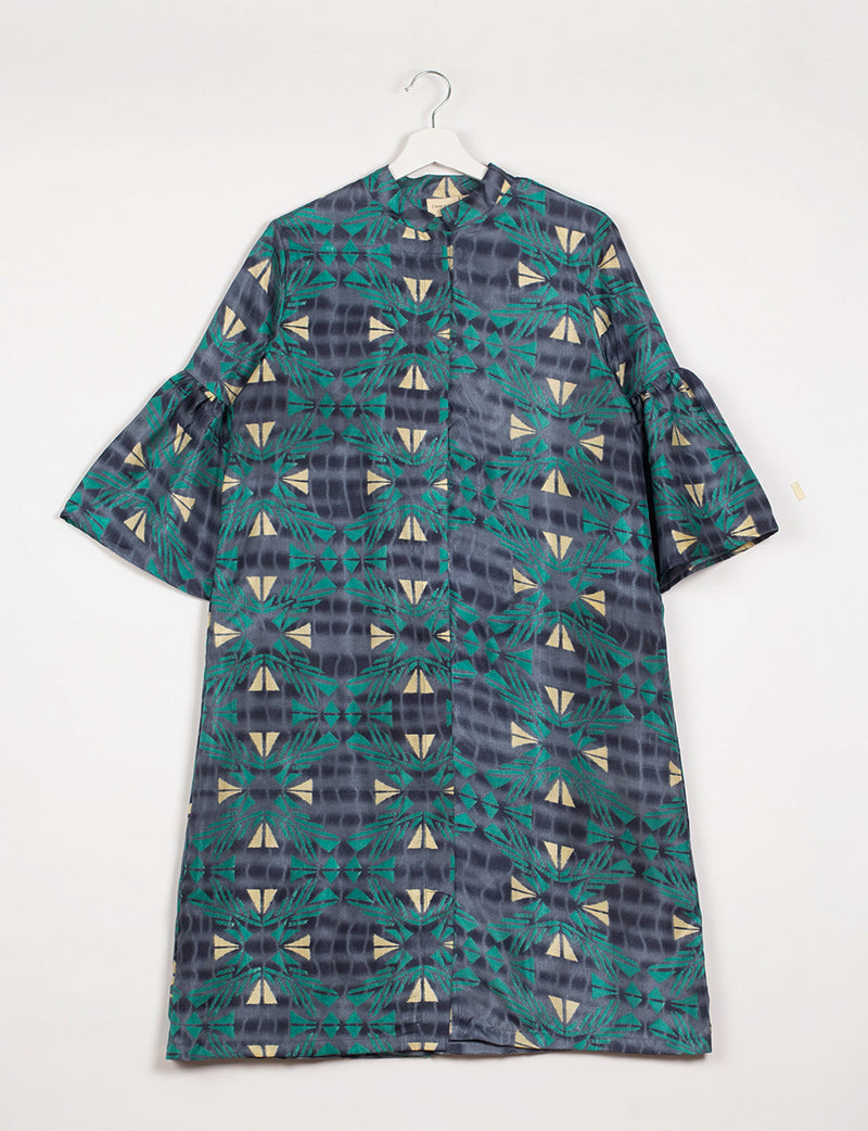 Blue geometric patterned bell sleeve coat with mandarin collar hanging on white hanger against white background