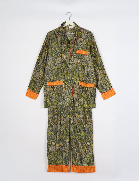 Chic long-sleeve pajama set made from recycled materials, representing eco friendly products, repurposed clothing, and zero waste clothing in green fashion.