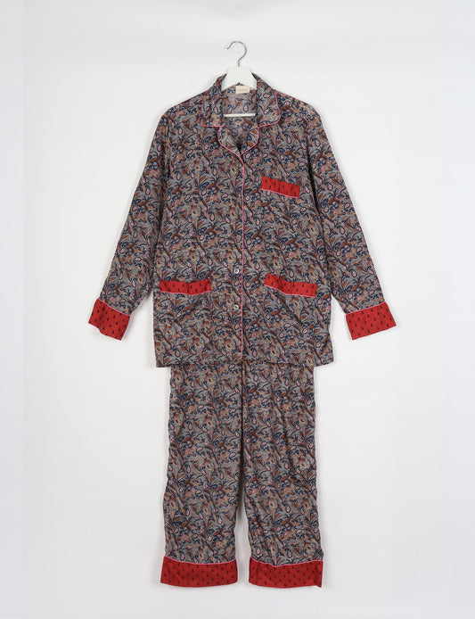 Chic long-sleeve pajama set made from recycled materials, representing eco friendly products, repurposed clothing, and zero waste clothing in green fashion.