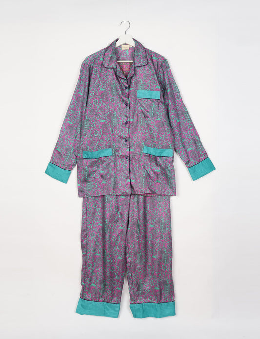 Chic long-sleeve pajama set made from recycled materials, representing eco friendly products, repurposed clothing, and zero waste clothing in green fashion.