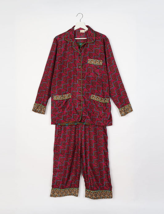 Chic long-sleeve pajama set made from recycled materials, representing eco friendly products, repurposed clothing, and zero waste clothing in green fashion.