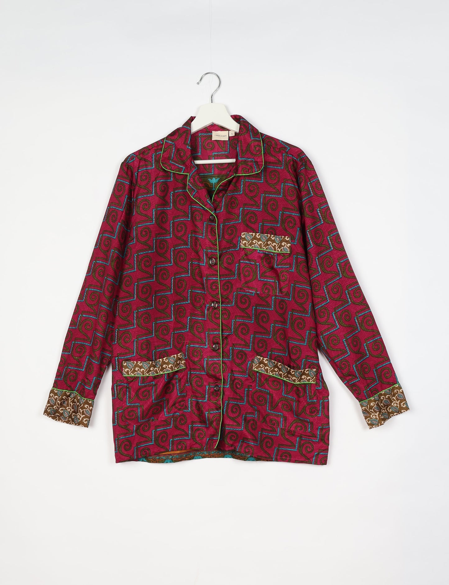 Chic long-sleeve pajama set made from recycled materials, representing eco friendly products, repurposed clothing, and zero waste clothing in green fashion.