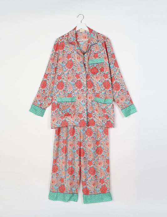 Chic long-sleeve pajama set made from recycled materials, representing eco friendly products, repurposed clothing, and zero waste clothing in green fashion.