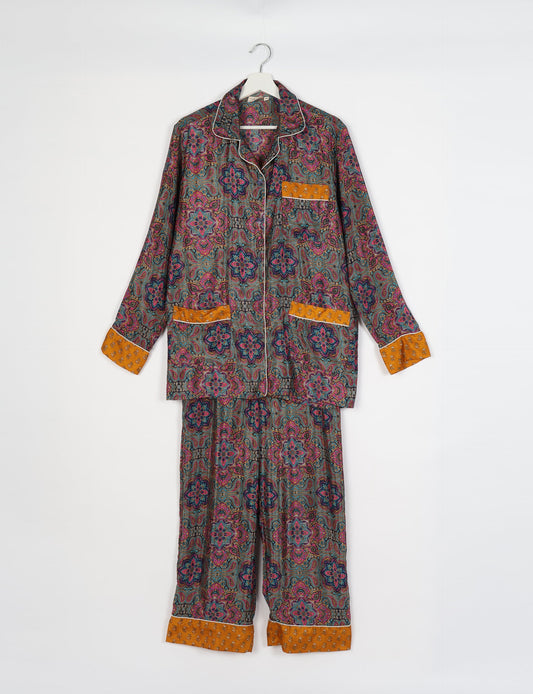 Chic long-sleeve pajama set made from recycled materials, representing eco friendly products, repurposed clothing, and zero waste clothing in green fashion.